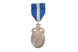 A George VI boxed silver Masonic medal.