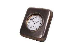 An early 20th century silver cased Goliath travel clock.