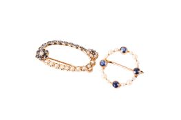 Two sapphire and cultured pearl brooches. The larger in a 9ct gold hallmarked mount, 3.1cm x 1.