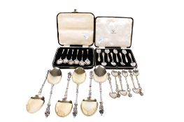 Two boxed sets of silver teaspoons,
