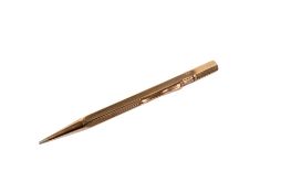 A vintage 9ct gold cased (tested) propelling pencil.