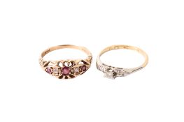 Two stone set gold rings.
