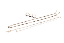 A group of gold and silver jewellery.