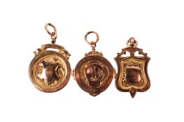 Three vintage 9ct gold medallions.