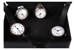 Four silver cased watches.