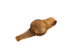 A Victorian gilt metal locket bracelet with enclosed oval hand colour photograph of a gentleman.