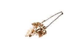 A 9ct pearl brooch in the form of a bunch of grapes.