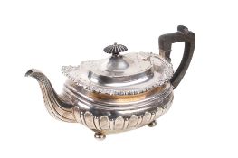 An early 20th century silver teapot.