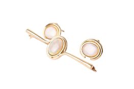 A set of 14ct gold (tested) opal earrings and bar brooch.