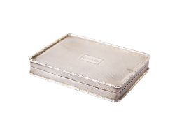 A George V silver cigarette case.