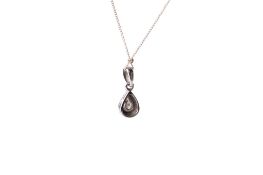 A 9ct white gold pendant and chain.