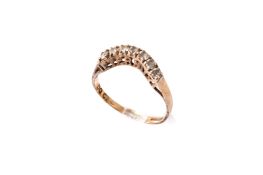 A 14ct gold and cubic zirconia ring.