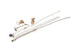 An assortment of gold, yellow metal and costume jewellery.