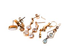 Three pairs of earrings.