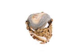 A yellow metal druzy quartz geode ring.