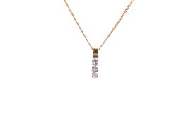 An 18ct gold and diamond pendant. Set with three round brilliant cut diamonds of 0.