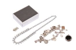 A small group of silver and costume jewellery and a watch fob.