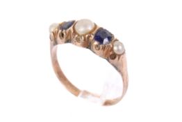 A 9ct gold and five stone ring.