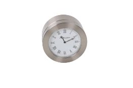 An Aquascutum duel time zone travel clock.