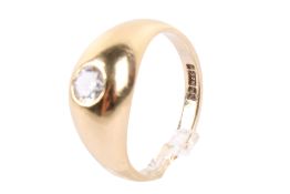 A 9ct gold and diamond ring. The round cut diamond of circa 0.