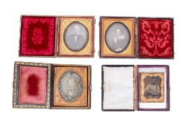 A group of four cased Victorian photographs.