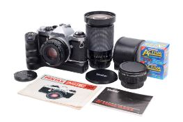 A Pentax ME Super 35mm SLR camera outfit. Chrome. Serial number 3939858. Shutter working.