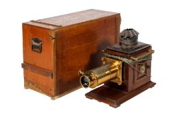 A large brass and mahogany Magic Lantern projector. Converted to electric.