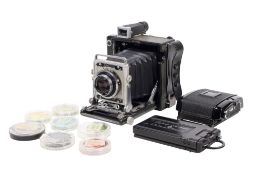 A Graflex Century Graphic large format rangefinder camera. With a Schneider Kreuznach 105mm f3.