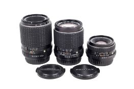 Three Pentax K-mount lenses. To include an SMC Pentax-M 28mm f2.