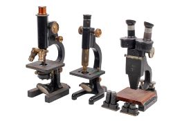 Three microscopes.