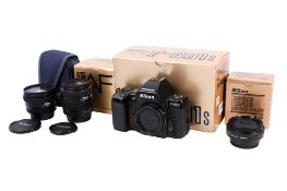 Nikon F-801s AF 35mm film camera body, boxed with lenses.