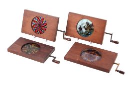 Four wood-framed hand-coloured animated moving Magic Lantern Slides.