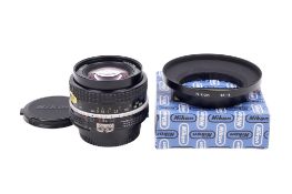 A Nikon 20mm f3.5 Nikkor lens. Serial number 183056.