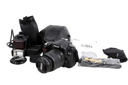 Nikon D80 digital SLR camera with a Nikkor AF-S DX 18-55mm lens, etc.