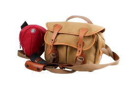 A Billingham canvas camera outfit bag plus a Crumpler Jimmy Bo 300 camera case. (2).