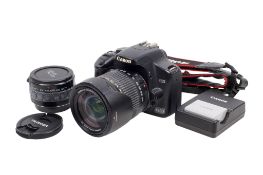 A Canon EOS 450D Digital SLR camera. Powers on, shutter working.