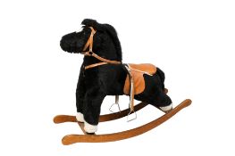 A Mamas & Papas rocking horse.