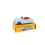A Dinky No.106 diecast Austin Atlantic Convertible. Blue body with cerise interior and red hubs.