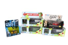 Five Corgi diecast novelty TV vehicles.
