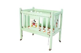 A vintage Mickey Mouse dolls crib.