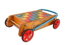 A vintage Tri-ang Baby Walker.