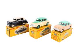 Three Dinky diecast saloon cars. Comprising a No.