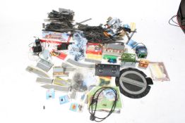 An assortment of 00 gauge layout accessories.