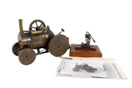 A vintage scratchbuilt locomotive and live steam engine. The engine and wheels constructed of a J.S.