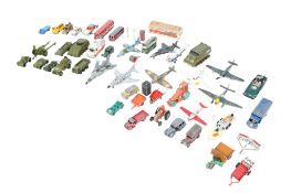 A collection of playworn Dinky diecast vehicles. Including a No.722 Harrier GR MK1, No.