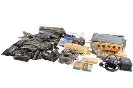 An assortment of 00 gauge track and layout accessories.