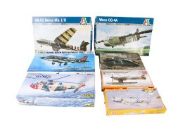 A collection of military plastic model kits.