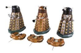 Three vintage Doctor Who radio controlled Dalek models.
