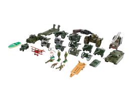 A collection of playworn diecast military vehicles.