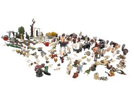 A collection of lead farming accessories and animal figures.